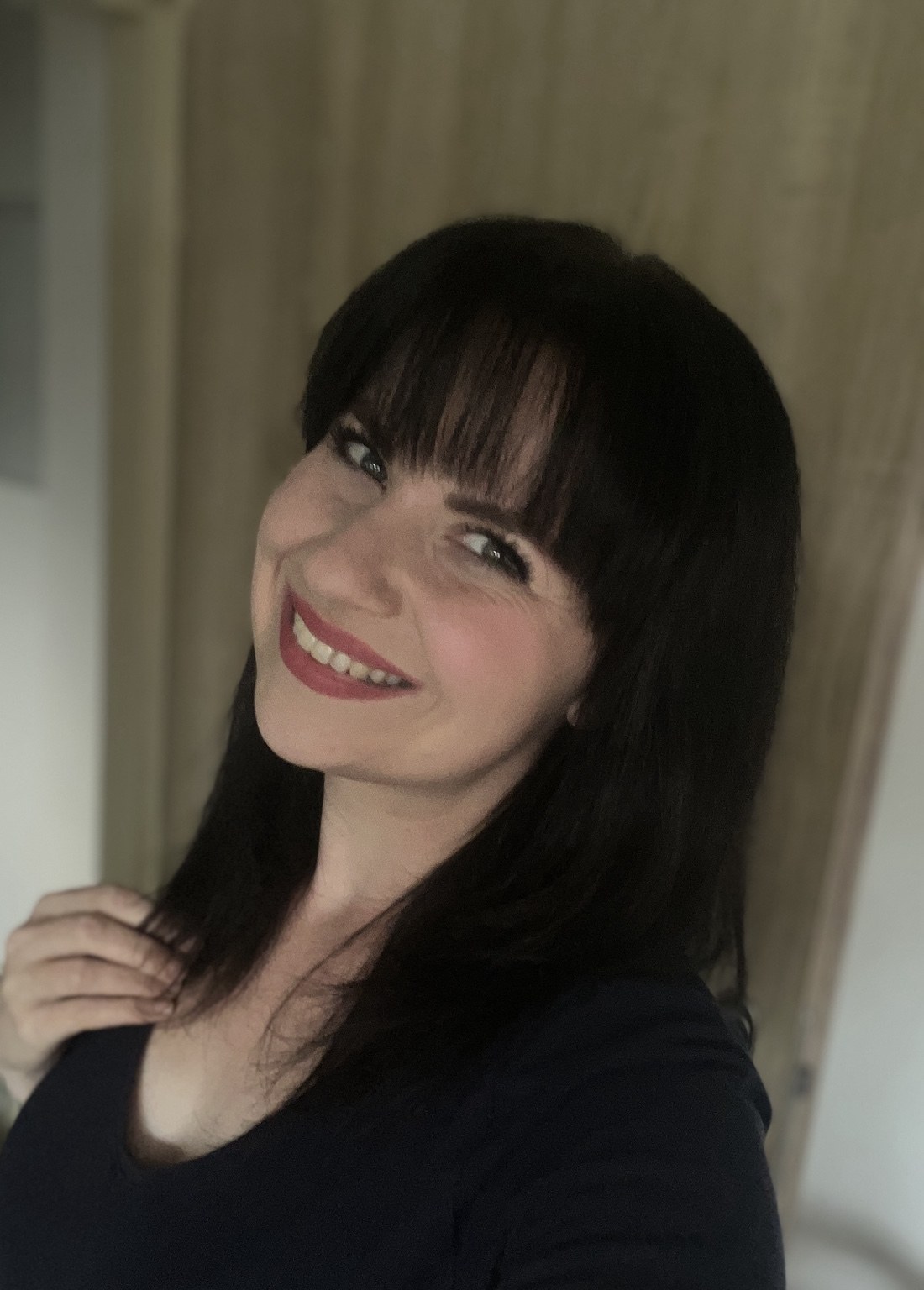 Simona Slánská se usmívá do fotoaparátu